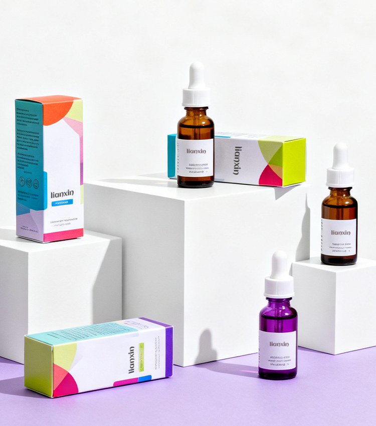 Amber and purple glass dropper bottles with dropper caps and custom printed folding cartons for retail cosmetic packaging