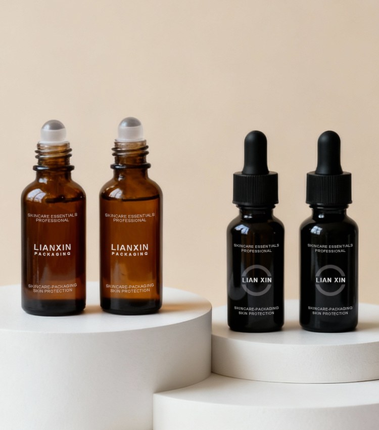 Amber glass essential oil roller bottles and black glass dropper bottles for child-resistant cosmetic and aromatherapy packaging