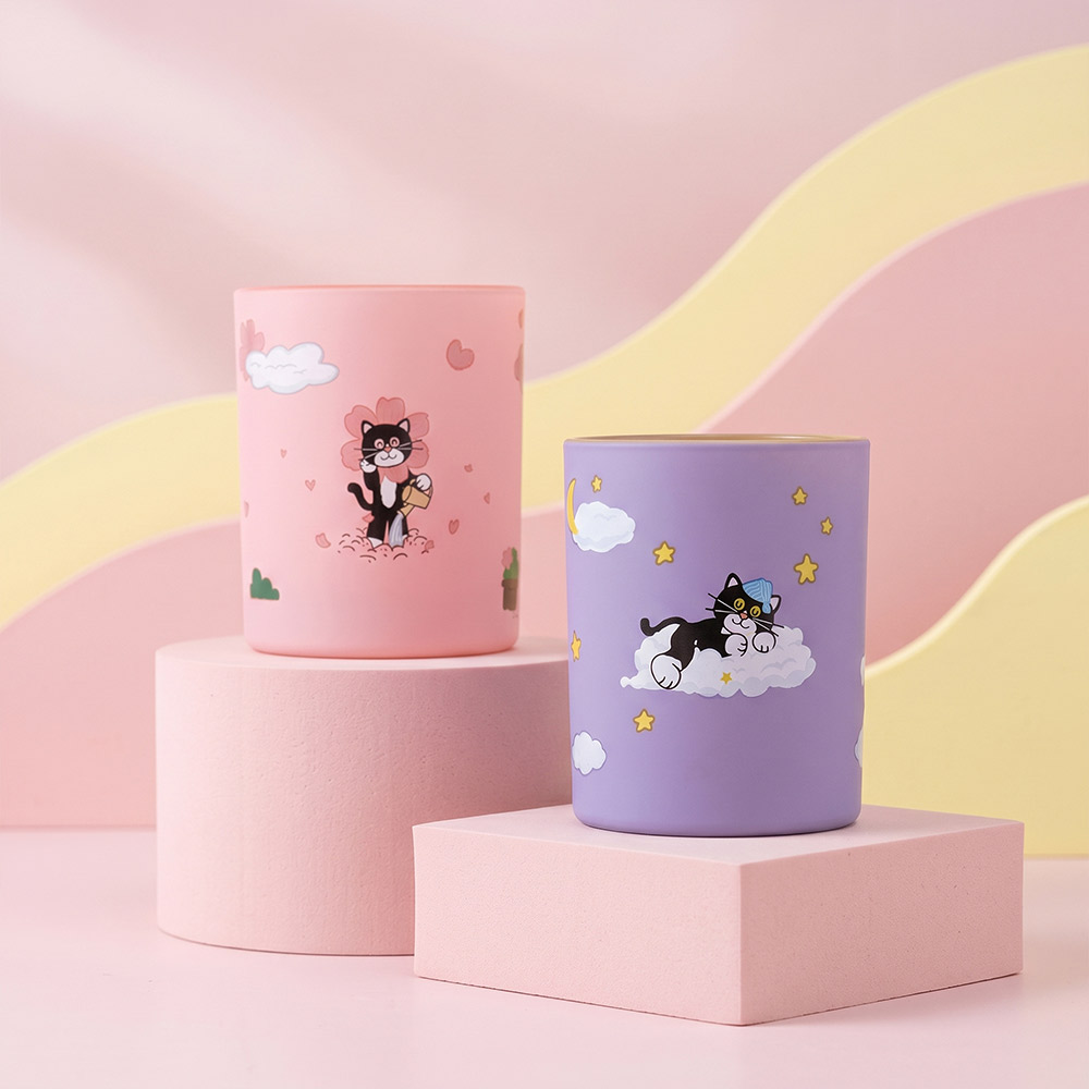 Pastel pink and lavender matte glass jars with cat prints