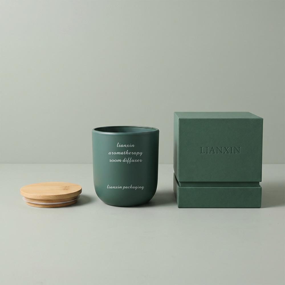 Stack of custom branded candle gift boxes with 200ml jars