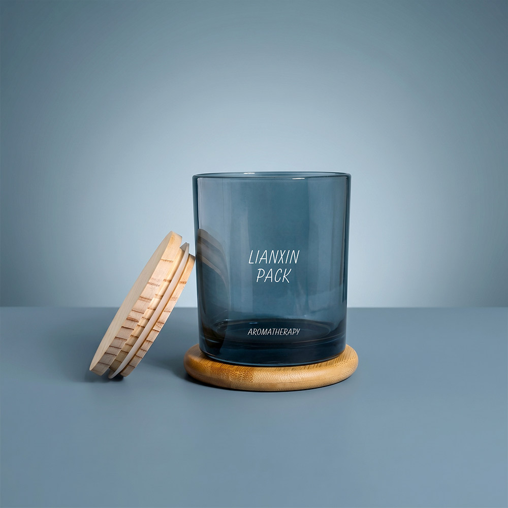 blue glass candle jar with wooden cap