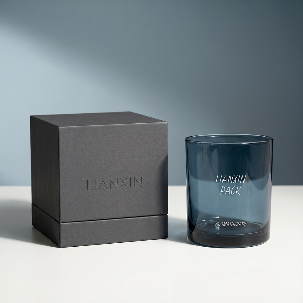 blue glass candle jar with packaging