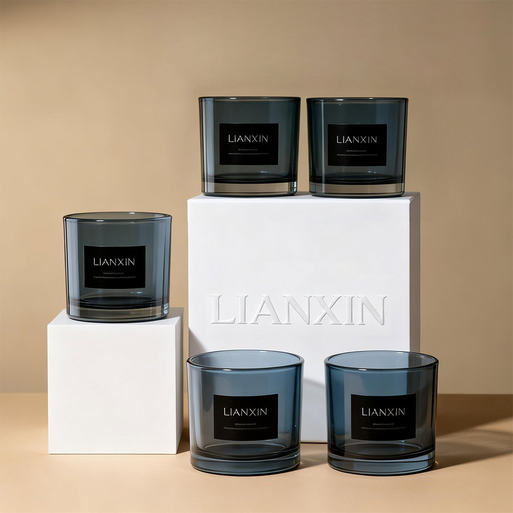 blue glass candle vessel with label