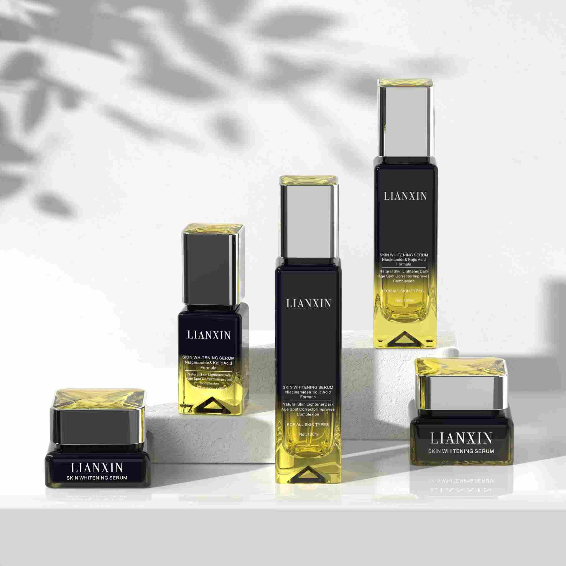 Luxury yellow gradient glass skincare bottles and cream jars