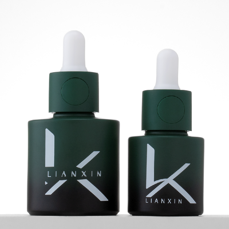 green glass dropper bottle