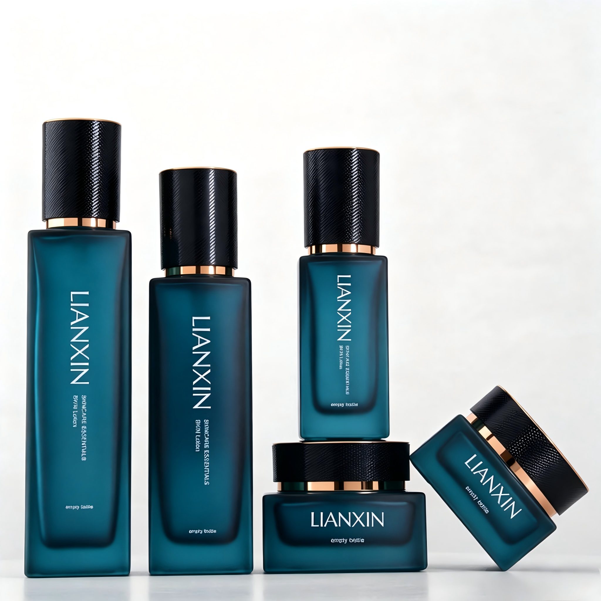 Luxury frosted blue glass cosmetic bottles in 40ml, 100ml and 120ml with matching 30g and 50g