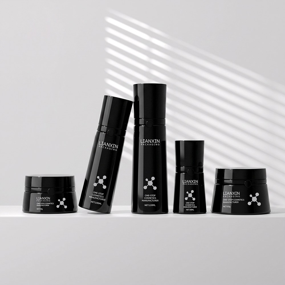 glossy black lotion bottle set studio photography