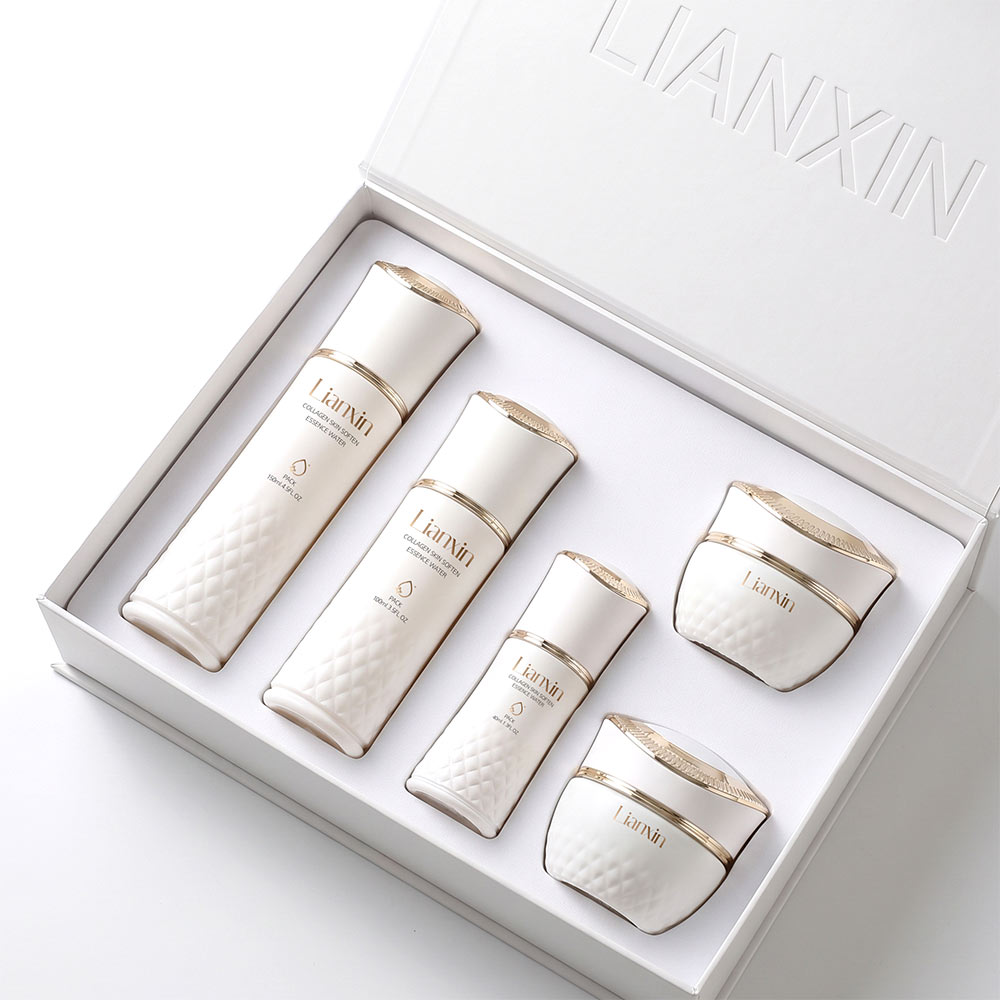 Luxury white glass cosmetic bottle set with gold caps in custom gift box