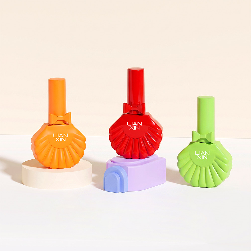 18ml Shell Shaped Glass Nail Polish Bottle with Brush Cap 1 18ml shell shaped nail polish bottles in orange, red and green with bow-detail caps
