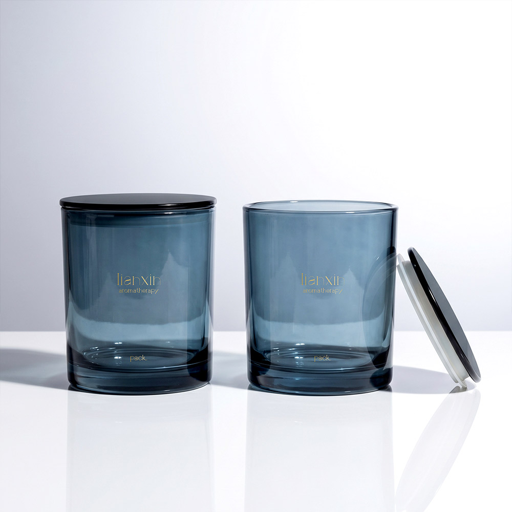 Two 430ml smoky blue glass candle jars with optional plastic lids