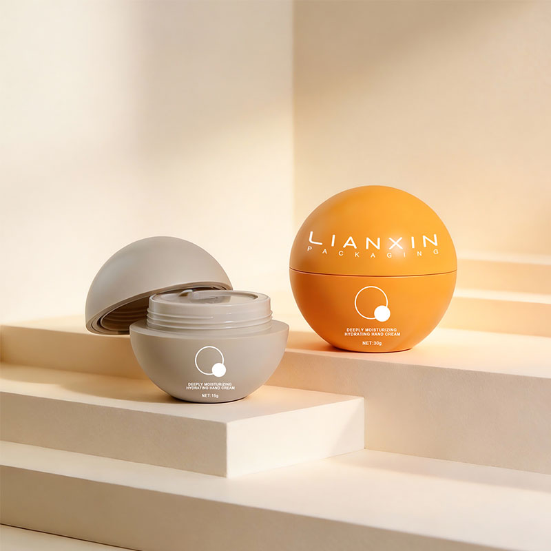 Orange and gray spherical plastic cosmetic jars with screw lids
