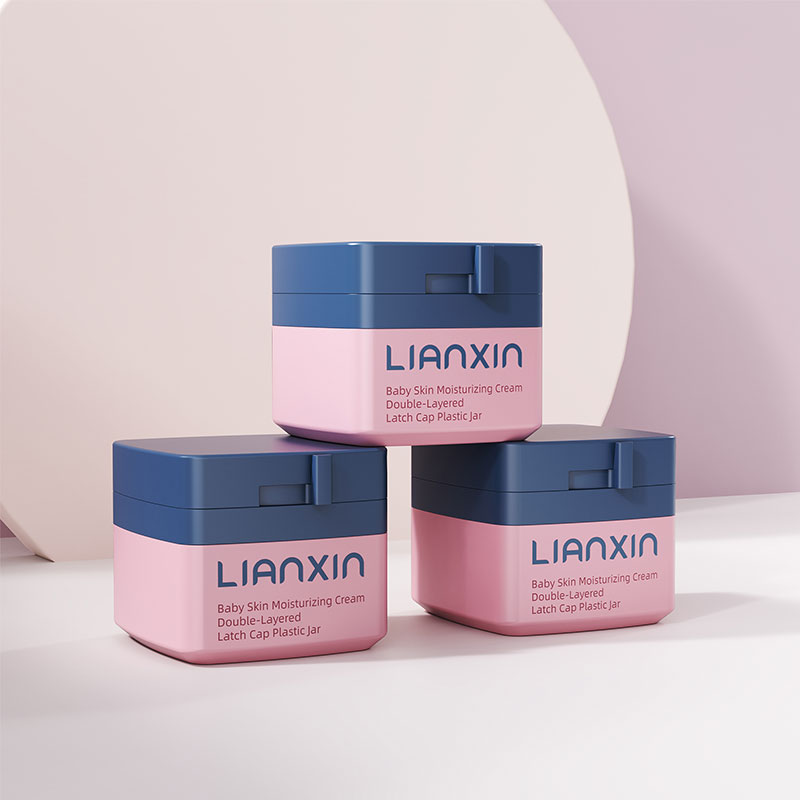 Blue and pink square cosmetic jars with distinctive latch caps