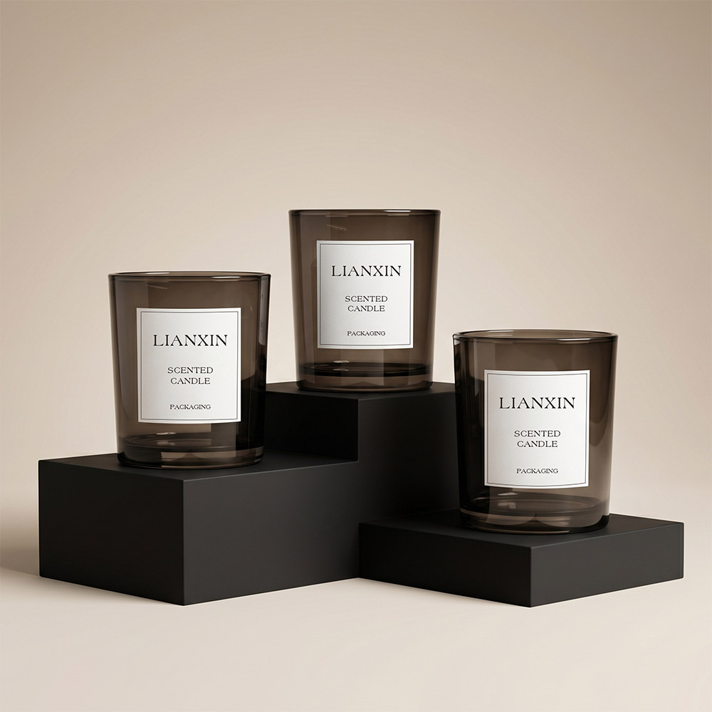 Three 210ml smoky brown glass candle jars with custom labels