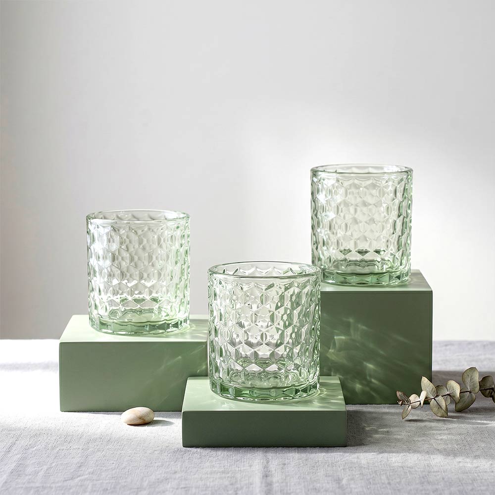 260ml Textured Clear Glass Candle Jar with Custom Gift Box 2 Three 260ml textured clear glass candle jars on green display blocks