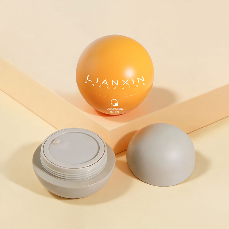 Orange spherical plastic cosmetic jar with screw lid and inner cover