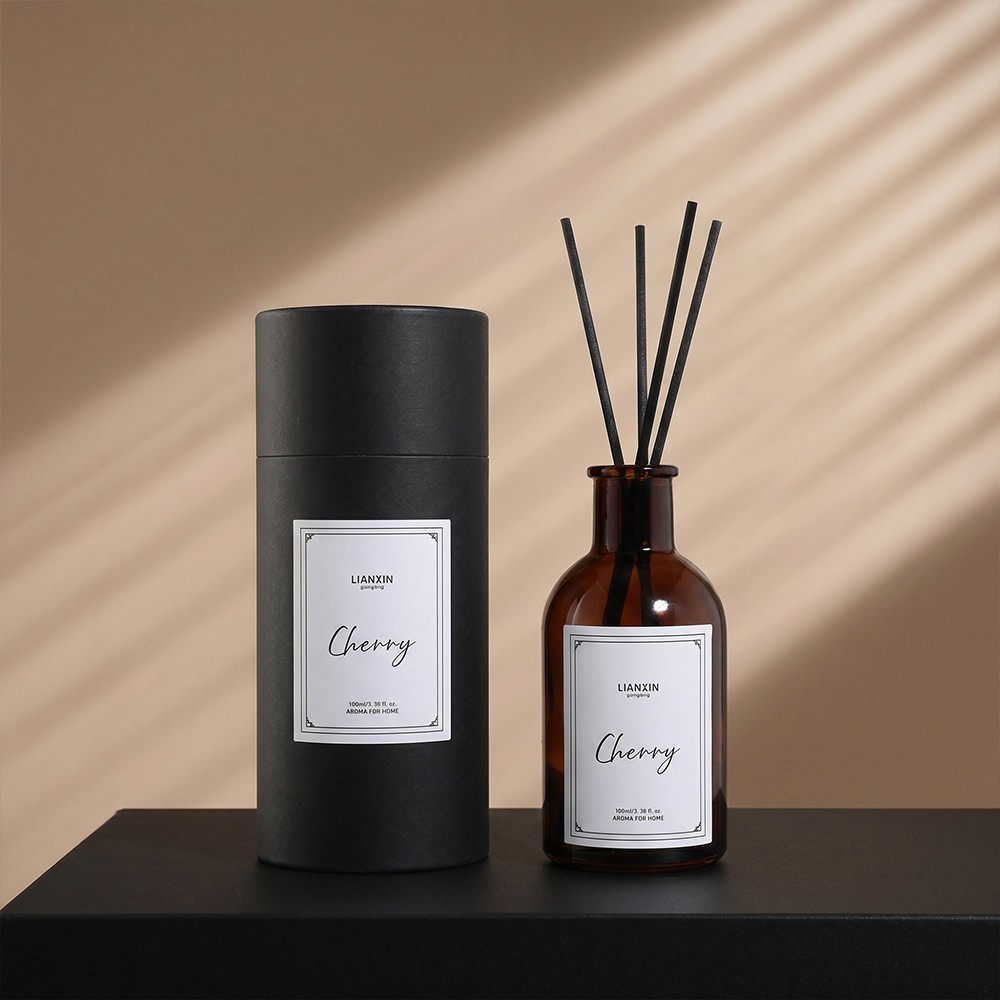 100ml Amber Glass Round Shoulder Reed Diffuser Bottle 3 100ml amber glass reed diffuser bottle with black cylindrical gift tube packaging
