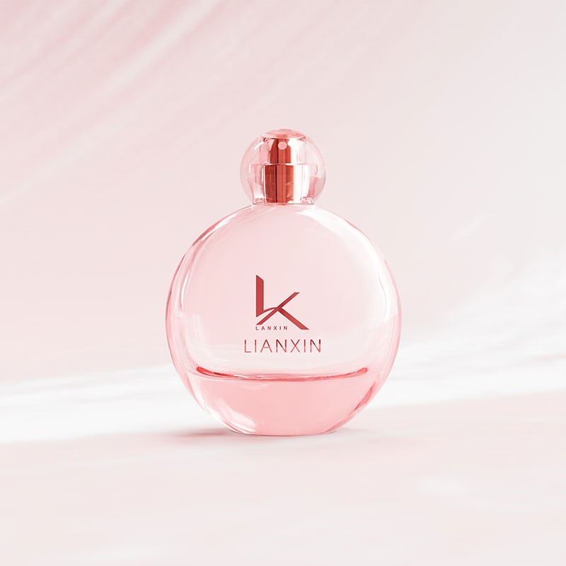 100ml round glass perfume bottle with ball cap in translucent pink