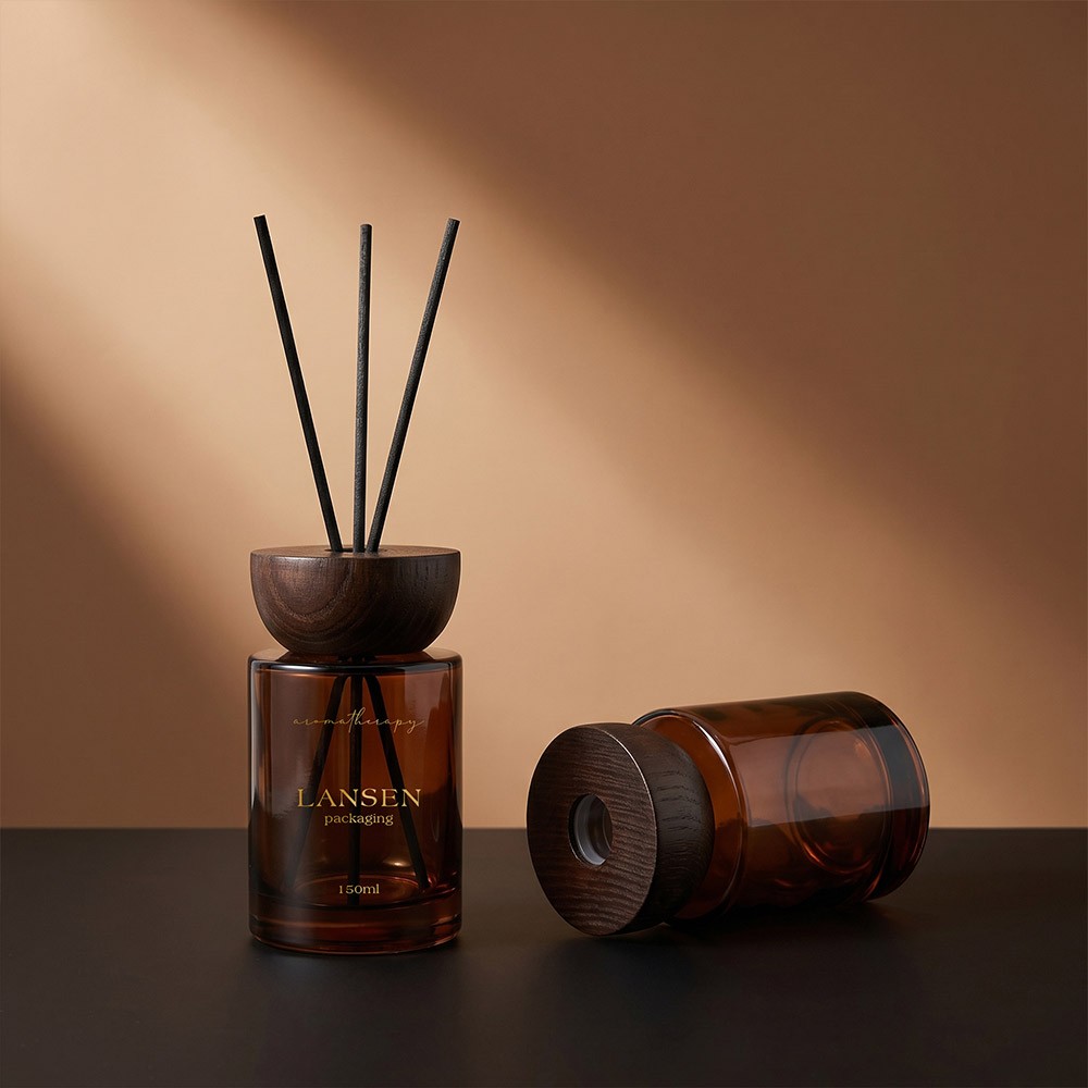 150ml amber glass cylindrical reed diffuser bottle with rounded wooden cap and black reeds