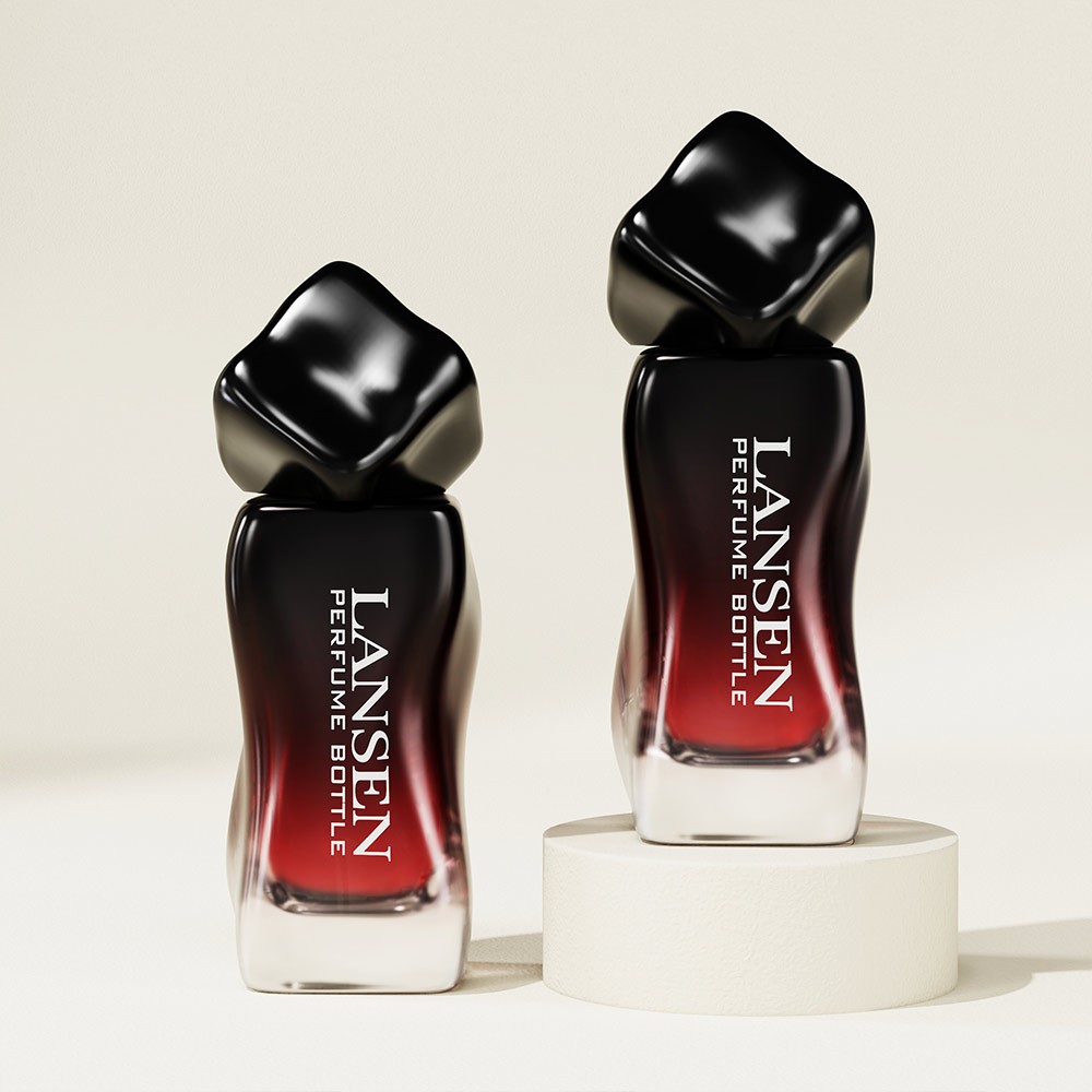 two 30ml wavy shaped perfume bottles fading from black at the shoulder to red at the base, both with black twisted caps