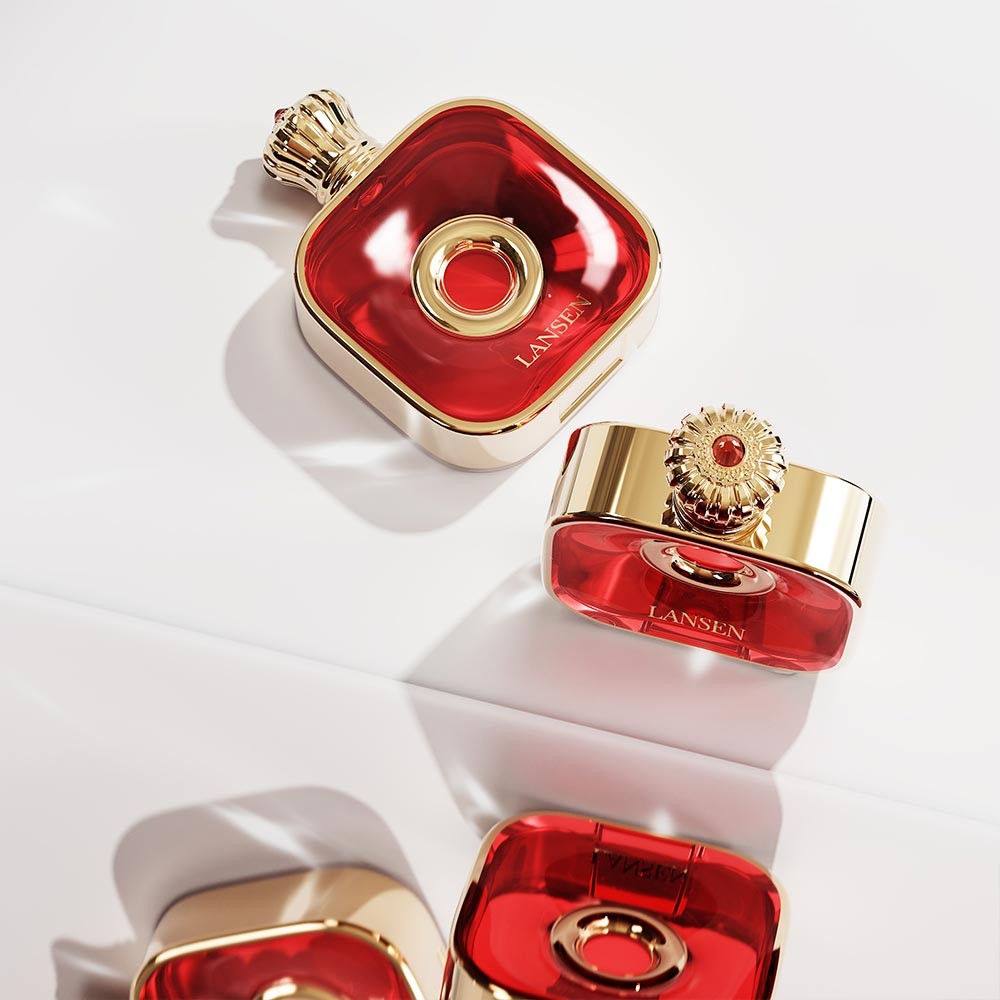 vivid red 50ml flat square perfume bottles with gold crown caps and gold plated frames, one standing and one lying flat