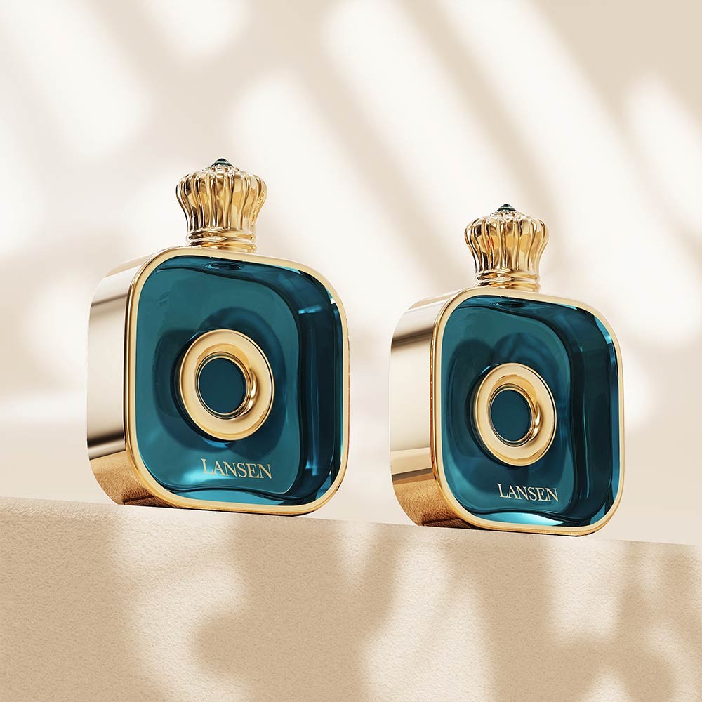 deep teal 50ml flat square perfume bottles with gold crown caps and gold plated frames around the front panel