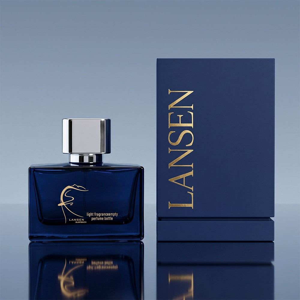 50ml navy blue cologne bottle with a polished mirror silver cap standing beside a navy gift box printed in gold