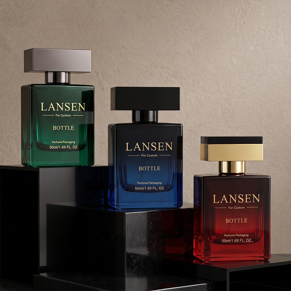 50ml blue gradient rectangular cologne bottle with a black block cap beside a matte black gift box printed in gold