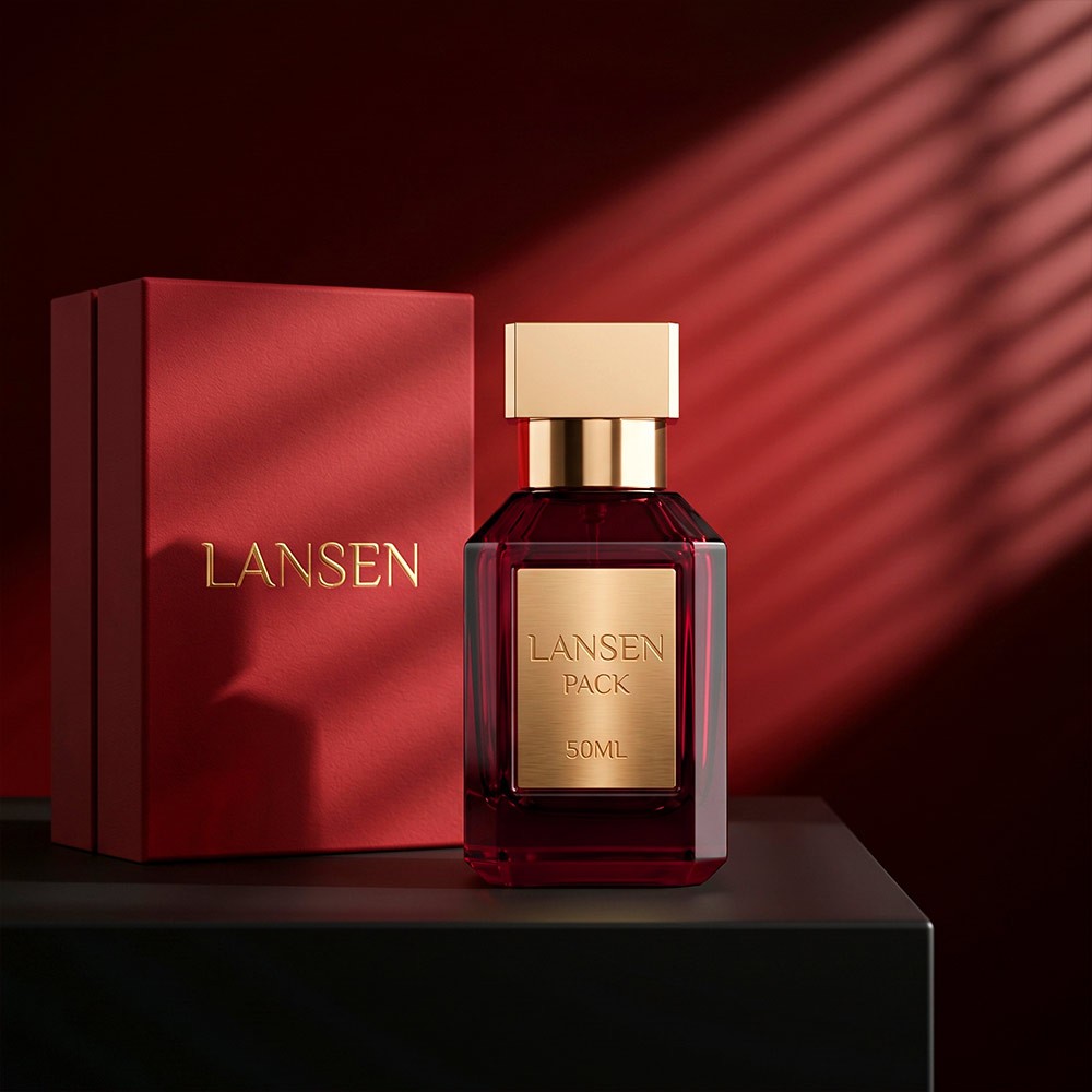 50ml rectangular glass perfume bottle in deep red with a gold square cap standing beside a red rigid gift box