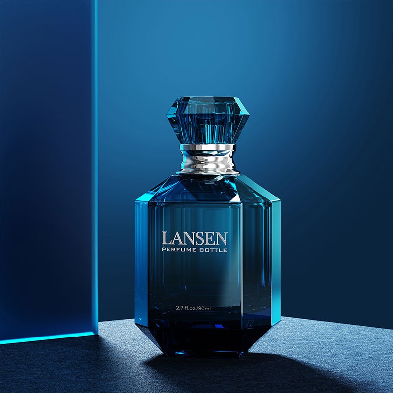 80ml octagonal faceted glass perfume bottle in blue with a faceted cap and a polished metal collar
