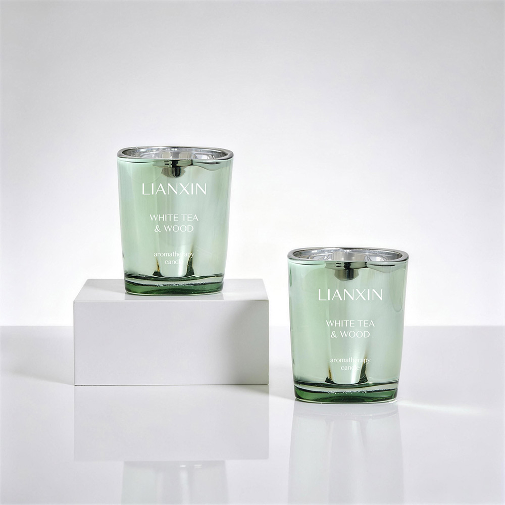 Two 67ml metallic mint green glass candle jars for mini candles