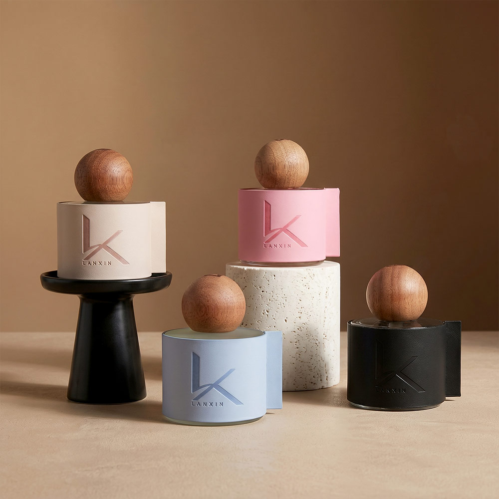 50ml leather wrapped reed diffuser bottles in cream pink blue and black