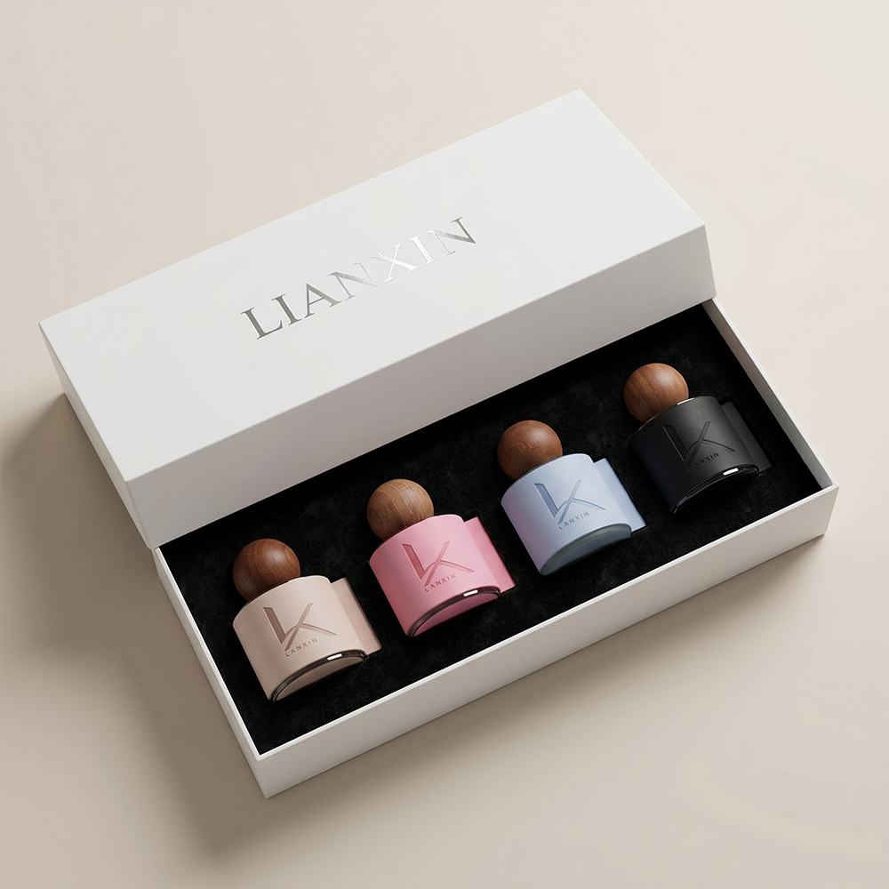 presentation box with four 50ml leather wrapped reed diffuser bottles