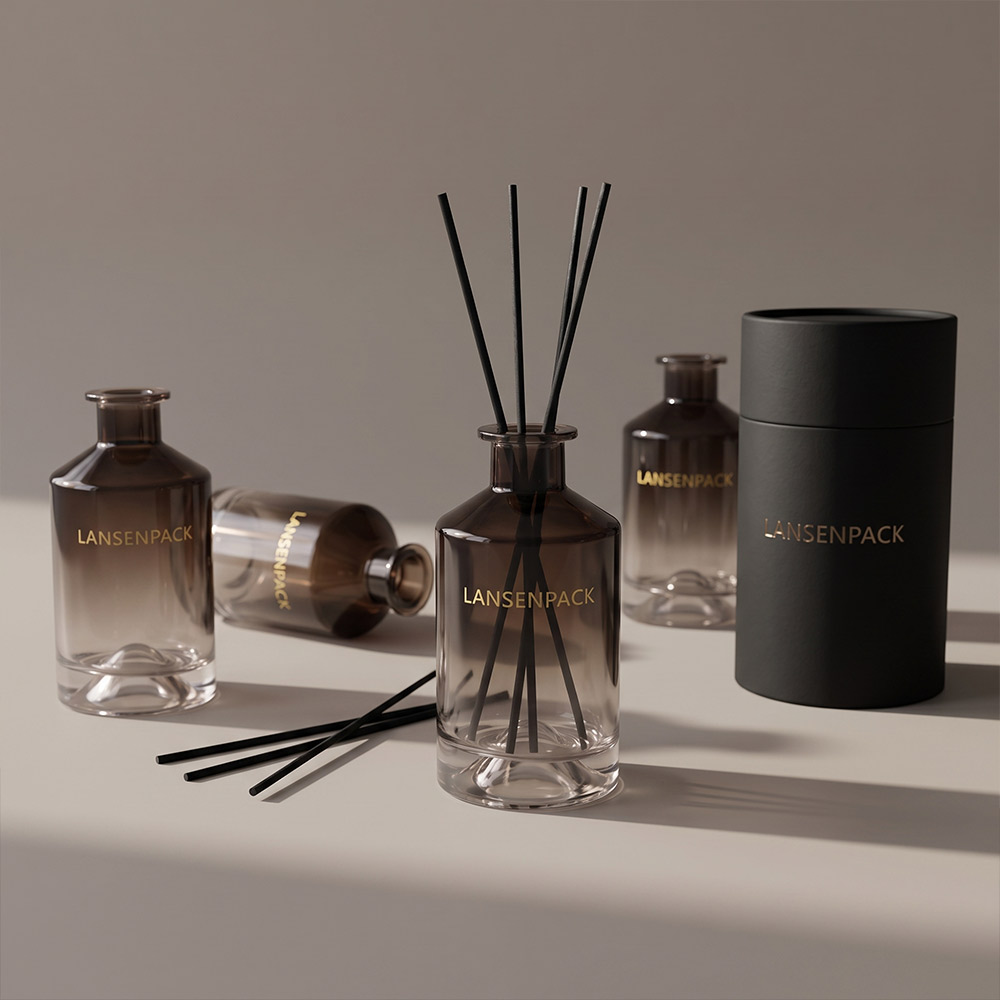 Smoky brown gradient glass diffuser bottles with black reeds and black presentation tube