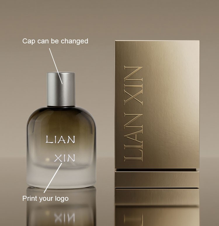 custom barrel shaped perfume bottle showing a changeable brushed silver cap and a printed brand logo beside a brushed gold box