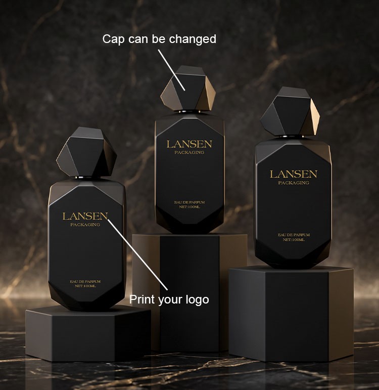three custom black irregular perfume bottles showing changeable facet caps in matte black and gold and a printed brand logo