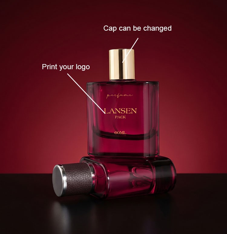 custom rounded corner red perfume bottles showing a changeable gold cap and a printed brand logo on the front panel