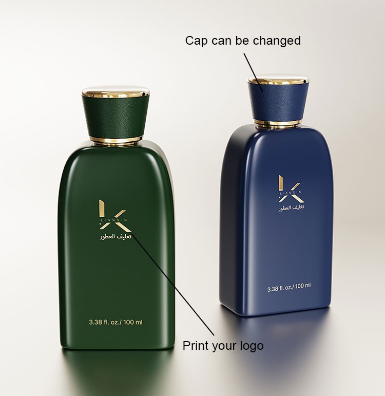 custom sloped shoulder perfume bottles in dark green and navy showing a changeable leather covered cap and printed logo