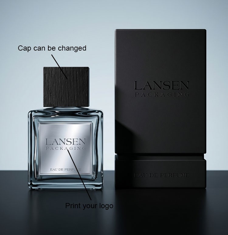 custom square perfume bottle showing a changeable wooden cap and a metal label carrying a printed logo, beside a matte black box