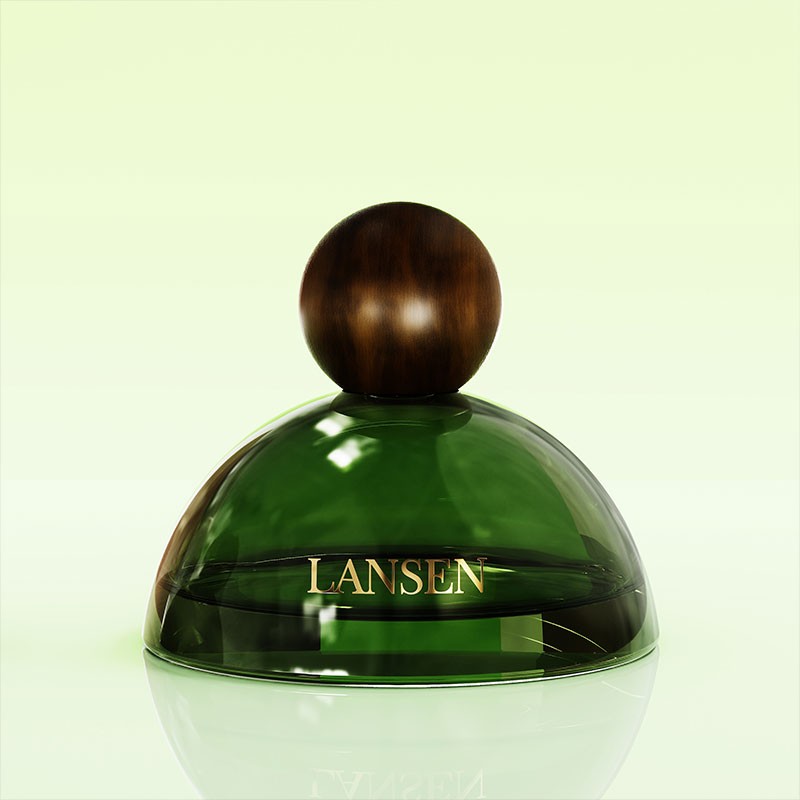 green dome glass perfume bottle with a dark wooden ball cap on a pale green background